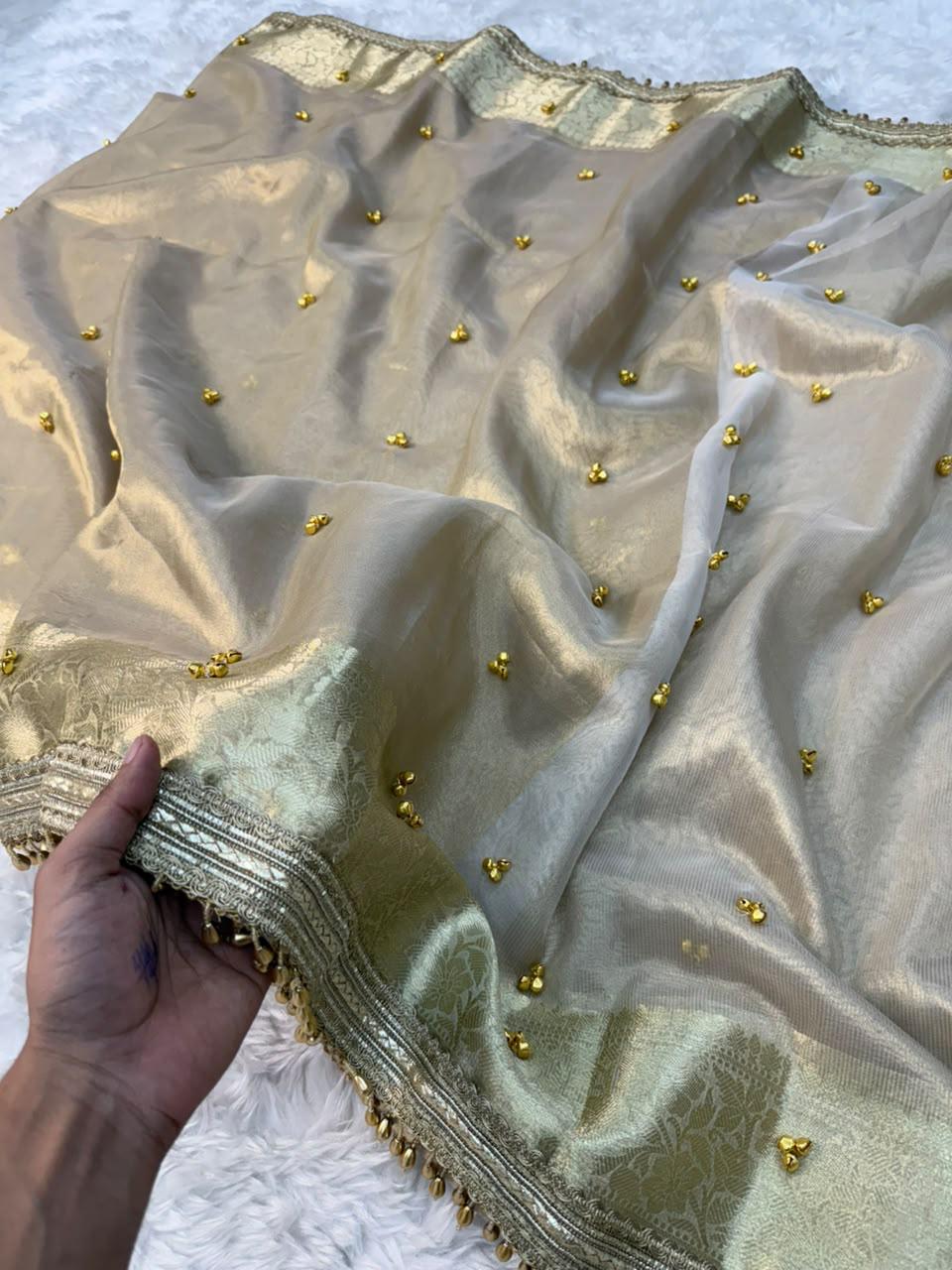 ghungroo collection introducing our elegant banarasi glass tissue saree in a timeless silver & ivory palette 🤍✨