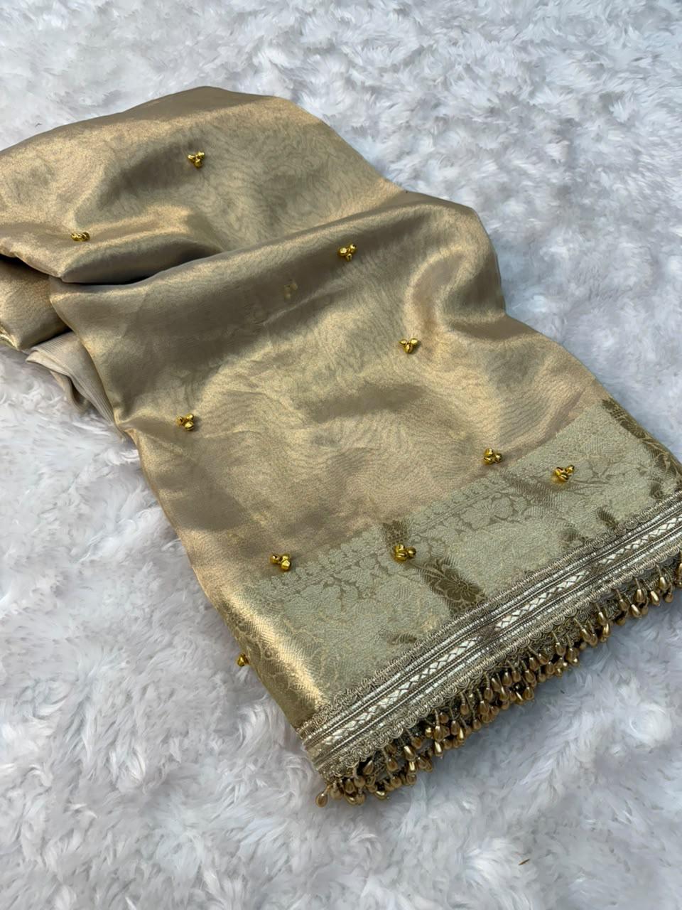 ghungroo collection introducing our elegant banarasi glass tissue saree in a timeless silver & ivory palette 🤍✨